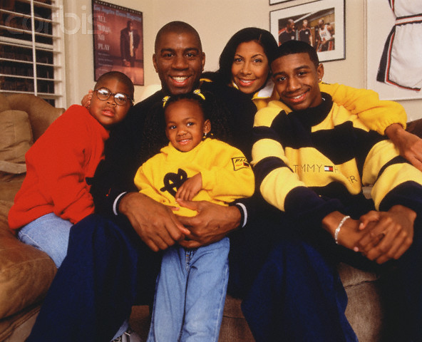 Magic Johnson at home with his family. Wife Cookie, sons Earvin III, Andre, daughter Elisa.