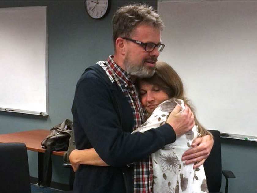 kevin-and-julie-garratt-embrace-at-vancouver-airport-after-his-release