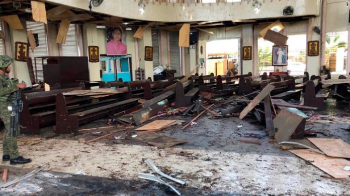 Inside a Roman Catholic cathedral in Jolo, the capital of Sulu province in southern Philippines after two bombs exploded Sunday, Jan. 27, 2019.