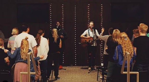 Edward Byrd, front left, and Joshua Buchanan, front right, lead worship.