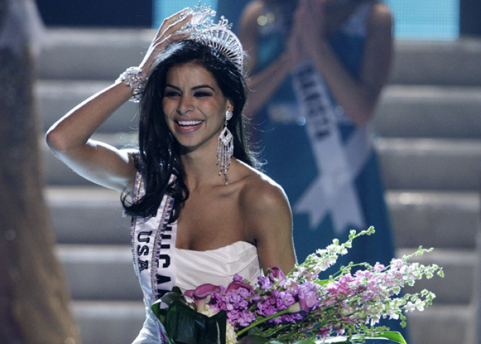 Miss Michigan Rima Fakih reacts after being crowned Miss USA during the 2010 Miss USA pageant at the Planet Hollywood Resort and Casino in Las Vegas, Nevada May 16, 2010.