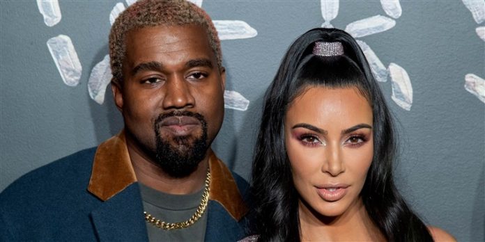 Kanye West with his wife Kim Kardashian West