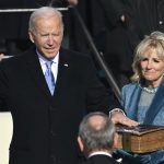 Jill-Biden-holds-the-Bible-as-Joe-Biden-is-sworn-in-as-the-46th-president-of-the-United-States-on-Jan.-20-2021
